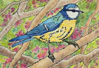 colourful embroidered bluetit textile art with painted and stitched background of branches leaves and berries